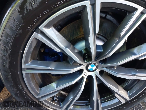 2020 BMW X5 M50i with VIN 5UXJU4C03LL227857, listed as a IAAI auction lot 41351112 with 65,325 mi miles and . Bid and sale history available at DreamBid. Image 18.