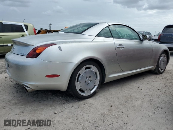 2002 Lexus SC 430 z VIN JTHFN48Y720005677, wystawiony jako Copart lot #74929694 z przebiegiem Nie podano mil oraz Szkody całkowita. Historia ofert i sprzedaży dostępna na DreamBid. Obrazek 3.
