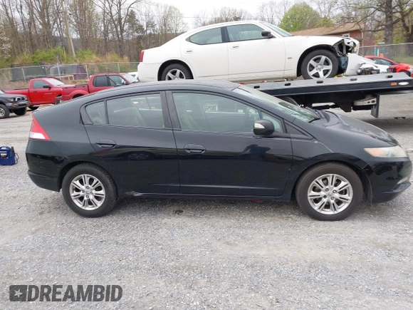 2010 Honda Insight EX with VIN JHMZE2H73AS002299, listed as a IAAI auction lot 41900761 with 251,934 mi miles and . Bid and sale history available at DreamBid. Image 13.