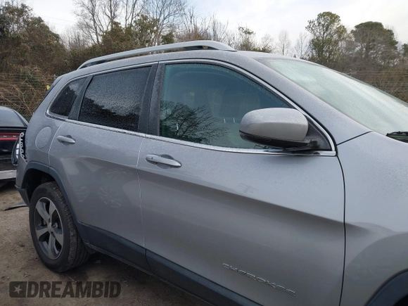 2019 Jeep Cherokee High Altitude with VIN 1C4PJMDX3KD423614, listed as a IAAI auction lot 41395694 with 64,494 mi miles and . Bid and sale history available at DreamBid. Image 13.