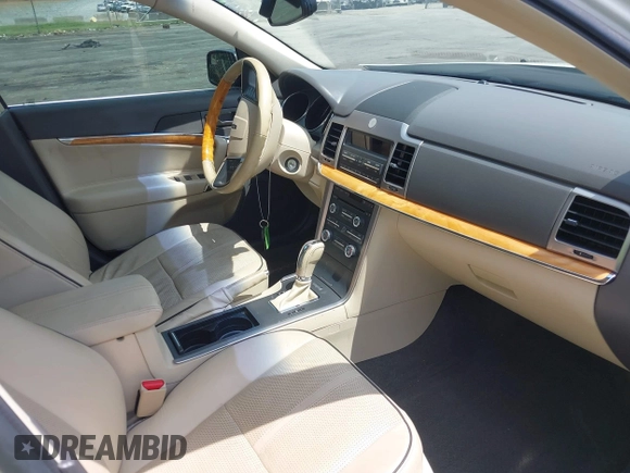 2012 Lincoln MKZ with VIN 3LNHL2GC1CR814101, listed as a IAAI auction lot 42594990 with 156,064 mi miles and . Bid and sale history available at DreamBid. Image 5.