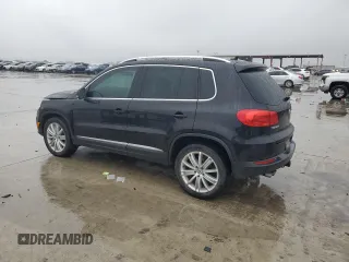 2013 Volkswagen Tiguan SE with VIN WVGAV3AX3DW617393, listed as a Copart auction lot 83616524 with 119,260 mi miles and Salvage title. Bid and sale history available at DreamBid. Image 2.