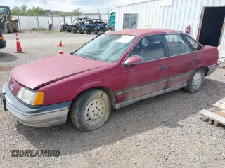 1989 Ford Taurus GL z VIN 1FABP52U9KA278657, wystawiony jako IAAI lot #42349469 z przebiegiem 10 782 mil mil oraz . Historia ofert i sprzedaży dostępna na DreamBid. Obrazek 2.