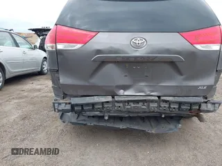 2012 Toyota Sienna XLE AAS with VIN 5TDYK3DC0CS252965, listed as a IAAI auction lot 42059909 with 321,983 mi miles and . Bid and sale history available at carsss.com. Image 6.