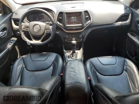 2014 Jeep Cherokee Limited with VIN 1C4PJLDS9EW221691, listed as a Copart auction lot 64095655 with 174,391 mi miles and Salvage title. Bid and sale history available at DreamBid. Image 8.