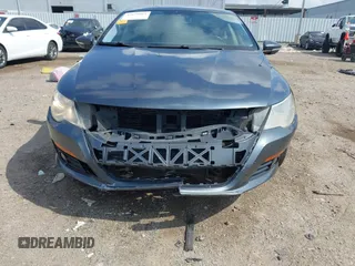2009 Volkswagen CC Sport with VIN WVWML73C79E553395, listed as a IAAI auction lot 42078061 with 167,110 mi miles. Bid and sale history available at carsss.com. Image 6.