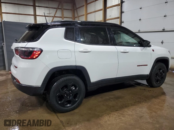 2023 Jeep Compass Trailhawk z VIN 3C4NJDDN1PT527851, wystawiony jako Copart lot #65566035 z przebiegiem 52 811 mil mil oraz Czysty tytuł • Clean title. Historia ofert i sprzedaży dostępna na DreamBid. Obrazek 3.