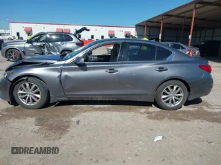 2015 Infiniti Q50 Premium z VIN JN1BV7AR9FM408386, wystawiony jako IAAI lot #42084887 z przebiegiem 122 527 mil mil oraz . Historia ofert i sprzedaży dostępna na DreamBid. Obrazek 15.