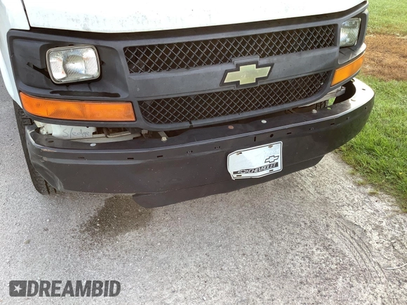 2013 Chevrolet Express Cargo z VIN 1GCSGAFX0D1173242, wystawiony jako IAAI lot #42792060 z przebiegiem 263 409 mil mil oraz . Historia ofert i sprzedaży dostępna na DreamBid. Obrazek 17.