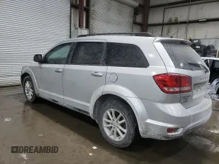 2013 Dodge Journey SXT with VIN 3C4PDCBB1DT558323, listed as a Copart auction lot 45953885 with 165,781 mi miles and Salvage Title. Bid and sale history available at DreamBid. Image 2.
