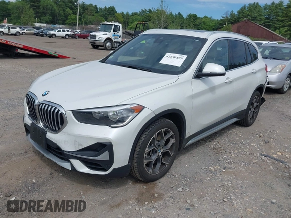 2021 BMW X1 xDrive28i with VIN WBXJG9C07M5U21337, listed as a IAAI auction lot 42590859 with 35,934 mi miles and . Bid and sale history available at DreamBid. Image 17.