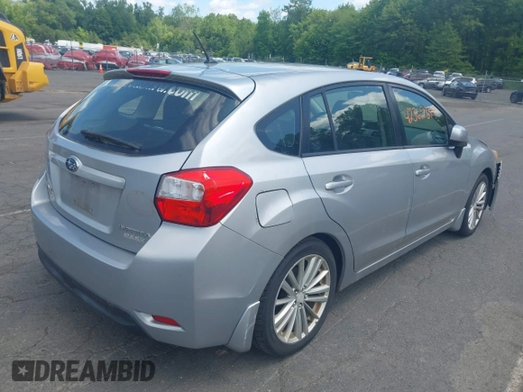 2012 Subaru Impreza Premium with VIN JF1GPAD68CH219928, listed as a IAAI auction lot 42362379 with 209,514 mi miles and . Bid and sale history available at DreamBid. Image 4.