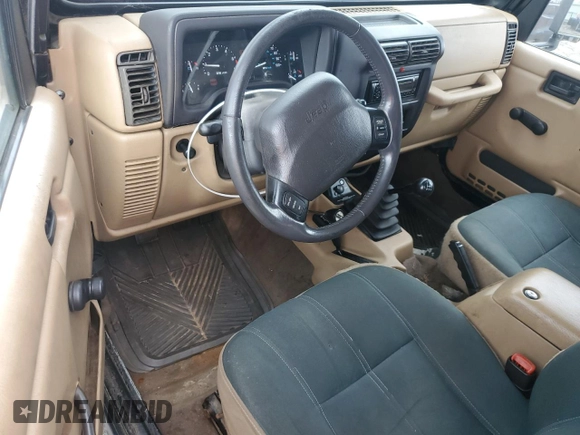 2000 Jeep Wrangler Sahara with VIN 1J4FA59S5YP761127, listed as a Copart auction lot 65247225 with 174,274 mi miles and Clean title. Bid and sale history available at DreamBid. Image 8.