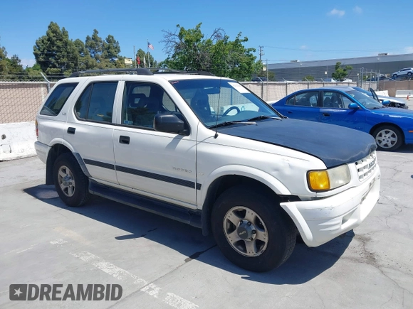 1999 Isuzu Rodeo S z VIN 4S2CM58WXX4347611, wystawiony jako IAAI lot #42351641 z przebiegiem 256 007 mil mil oraz . Historia ofert i sprzedaży dostępna na DreamBid. Obrazek 1.