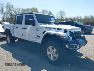2023 Jeep Gladiator Freedom z VIN 1C6JJTAGXPL571283, wystawiony jako IAAI lot #41812390 z przebiegiem 49 788 mil mil oraz . Historia ofert i sprzedaży dostępna na DreamBid. Obrazek 1.