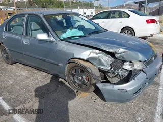 1996 Honda Accord LX with VIN 1HGCD5634TA291036, listed as a IAAI auction lot 41583543 with 166,725 mi miles and . Bid and sale history available at carsss.com. Image 6.