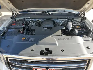 2015 GMC Yukon SLT with VIN 1GKS2BKC1FR736203, listed as a Copart auction lot 67977694 with 178,781 mi miles and Salvage Title. Bid and sale history available at carsss.com. Image 14.