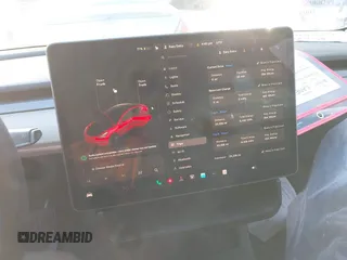2023 Tesla Model 3 z VIN 5YJ3E1EAXPF584537, wystawiony jako IAAI lot #41464243 z przebiegiem 33 229 mil mil oraz . Historia ofert i sprzedaży dostępna na DreamBid. Obrazek 19.
