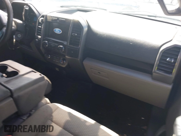 2019 Ford F-150 XL with VIN 1FTEW1E56KFA63764, listed as a IAAI auction lot 42410872 with 124,648 mi miles and . Bid and sale history available at DreamBid. Image 5.