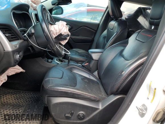 2014 Jeep Cherokee Trailhawk z VIN 1C4PJMBB5EW159957, wystawiony jako Copart lot #58535135 z przebiegiem 188 216 mil mil oraz Szkoda całkowita • Salvage title. Historia ofert i sprzedaży dostępna na DreamBid. Obrazek 7.