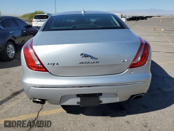 2015 Jaguar XJ with VIN SAJWA2GZ4F8V90853, listed as a Copart auction lot 72631114 with 59,237 mi miles and Salvage Title. Bid and sale history available at carsss.com. Image 6.