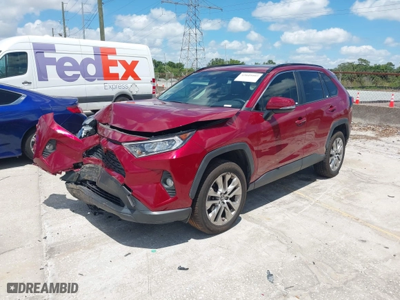 2021 Toyota RAV4 XLE Premium with VIN JTMC1RFV2MD080837, listed as a IAAI auction lot 42049997 with 25,823 mi miles. Bid and sale history available at carsss.com. Image 2.