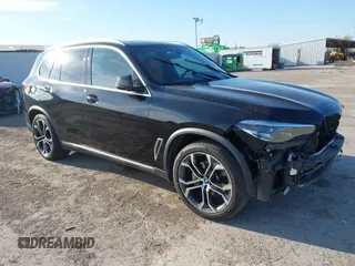 2021 BMW X5 sDrive40i with VIN 5UXCR4C03M9F14207, listed as a IAAI auction lot 41286501 with 41,679 mi miles. Bid and sale history available at carsss.com. Image 1.