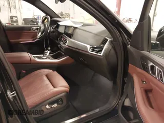 2023 BMW X5 xDrive40i with VIN 5UXCR6C08P9R88991, listed as a IAAI auction lot 41965881 with 33,136 mi miles. Bid and sale history available at carsss.com. Image 5.