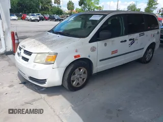 2008 Dodge Grand Caravan SE with VIN 1D8HN44H98B126418, listed as a IAAI auction lot 42223290 with 317,457 mi miles and . Bid and sale history available at DreamBid. Image 2.