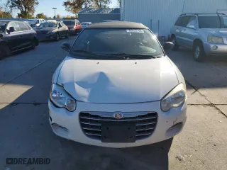 2004 Chrysler Sebring LX with VIN 1C3EL45X74N327583, listed as a Copart auction lot 82833194 with 114,804 mi miles and Salvage Title. Bid and sale history available at carsss.com. Image 5.