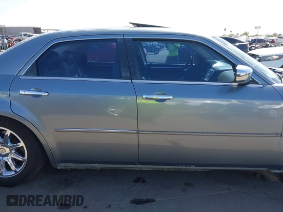 2006 Chrysler 300 C with VIN 2C3KA63H56H313967, listed as a IAAI auction lot 42056998 with 143,592 mi miles and . Bid and sale history available at carsss.com. Image 13.