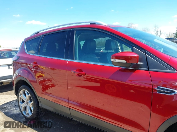 2017 Ford Escape Titanium with VIN 1FMCU9J96HUA68094, listed as a IAAI auction lot 42043893 with 85,893 mi miles. Bid and sale history available at carsss.com. Image 12.