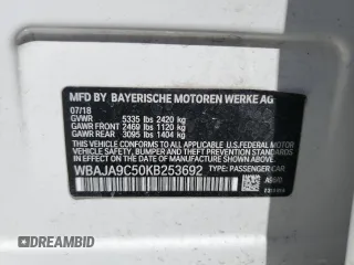 2019 BMW 5 Series 530e with VIN WBAJA9C50KB253692, listed as a Copart auction lot 52568095 with 61,023 mi miles and Salvage title. Bid and sale history available at DreamBid. Image 12.