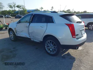 2015 Cadillac SRX Premium Collection with VIN 3GYFNDE32FS530357, listed as a IAAI auction lot 41976585 with 92,335 mi miles and . Bid and sale history available at carsss.com. Image 3.
