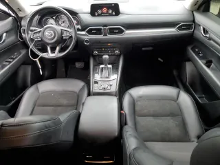 2020 Mazda CX-5 Touring with VIN JM3KFBCM1L0792706, listed as a Copart auction lot 73032144 with 56,845 mi miles and Salvage Title. Bid and sale history available at carsss.com. Image 8.