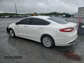 2013 Ford Fusion SE Hybrid with VIN 3FA6P0LU1DR358983, listed as a Copart auction lot 51907665 with 143,459 mi miles and Salvage Title. Bid and sale history available at DreamBid. Image 2.