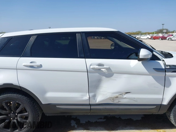2015 Land Rover Range Rover Evoque Pure with VIN SALVN2BG2FH073984, listed as a IAAI auction lot 41820047 with 75,318 mi miles. Bid and sale history available at carsss.com. Image 14.