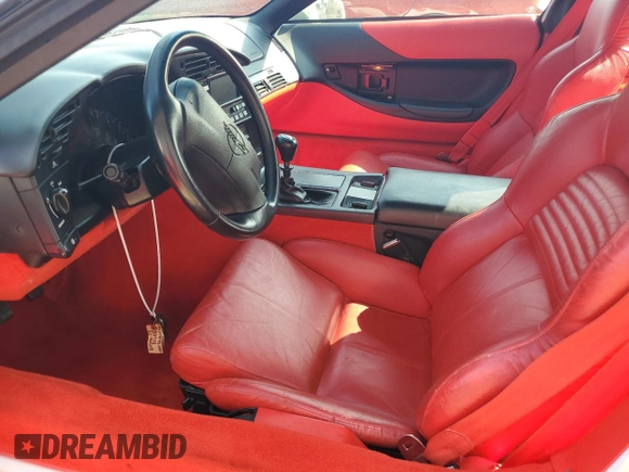 1994 Chevrolet Corvette z VIN 1G1YY22P6R5101716, wystawiony jako Copart lot #70466974 z przebiegiem 75 568 mil mil oraz Szkoda całkowita • Salvage title. Historia ofert i sprzedaży dostępna na DreamBid. Obrazek 7.