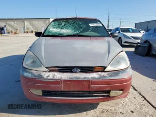 2000 Ford Focus ZX3 with VIN 3FAFP313XYR101516, listed as a Copart auction lot 51911325 with 180,653 mi miles and Salvage title. Bid and sale history available at DreamBid. Image 5.