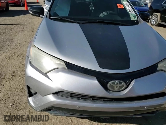 2018 Toyota RAV4 XLE with VIN 2T3RFREV5JW731373, listed as a Copart auction lot 51917465 with 124,623 mi miles and Salvage Title. Bid and sale history available at DreamBid. Image 12.