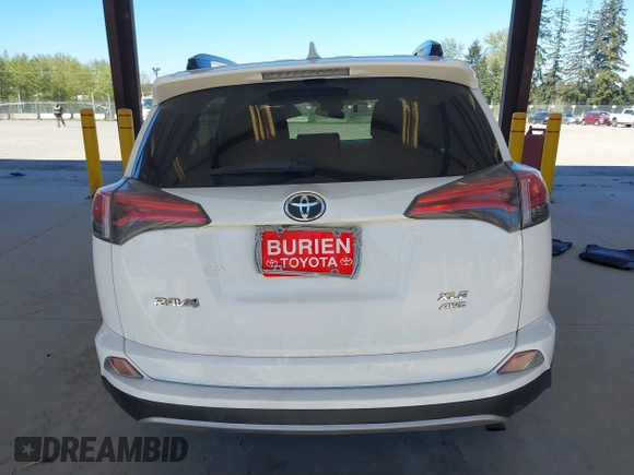 2018 Toyota RAV4 XLE with VIN JTMRFREVXJD240388, listed as a IAAI auction lot 42052065 with 117,114 mi miles. Bid and sale history available at carsss.com. Image 17.