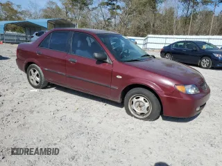 2003 Mazda Protege DX with VIN JM1BJ225030144551, listed as a Copart auction lot 50769905 with 179,876 mi miles and Salvage Title. Bid and sale history available at DreamBid. Image 4.