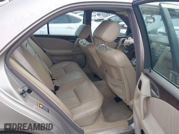1997 Mercedes-Benz E-Class with VIN WDBJF55F3VA391335, listed as a IAAI auction lot 41606546 with 1 mi miles. Bid and sale history available at carsss.com. Image 8.