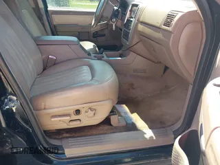 2003 Mercury Mountaineer Convenience z VIN 4M2DU86K43ZJ10878, wystawiony jako IAAI lot #42390874 z przebiegiem 194 867 mil mil oraz . Historia ofert i sprzedaży dostępna na DreamBid. Obrazek 5.