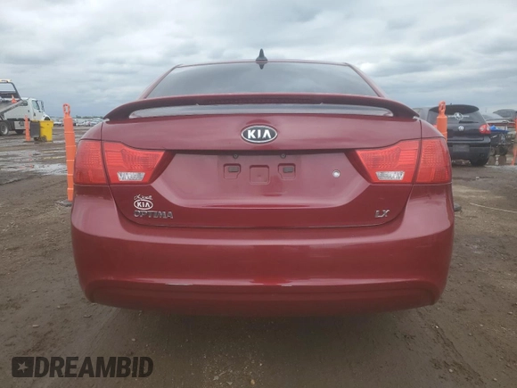 2009 Kia Optima LX z VIN KNAGE228395313765, wystawiony jako Copart lot #59707675 z przebiegiem 170 773 mil mil oraz Szkoda całkowita • Salvage title. Historia ofert i sprzedaży dostępna na DreamBid. Obrazek 6.
