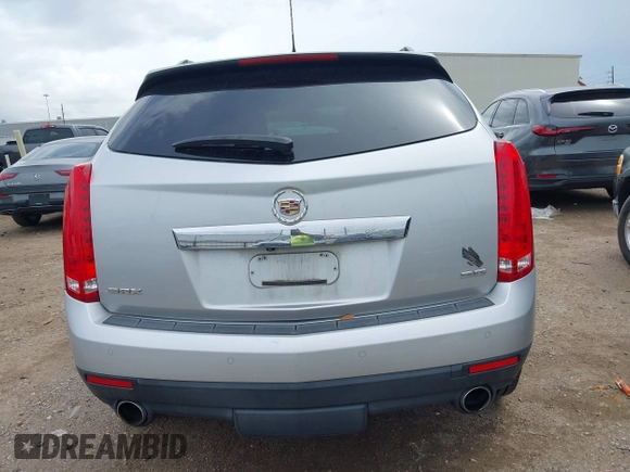 2015 Cadillac SRX Performance Collection z VIN 3GYFNCE36FS633386, wystawiony jako IAAI lot #41851338 z przebiegiem 102 586 mil mil oraz . Historia ofert i sprzedaży dostępna na DreamBid. Obrazek 16.