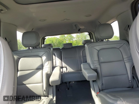 2019 Lincoln Navigator Reserve z VIN 5LMJJ2LT7KEL14794, wystawiony jako Copart lot #58186585 z przebiegiem 93 492 mil mil oraz Szkoda całkowita • Salvage title. Historia ofert i sprzedaży dostępna na DreamBid. Obrazek 10.