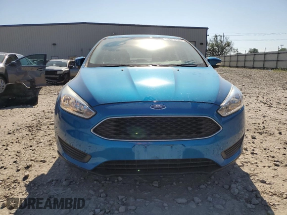 2017 Ford Focus SE z VIN 1FADP3F25HL218829, wystawiony jako Copart lot #63070195 z przebiegiem 64 039 mil mil oraz Czysty tytuł • Clean title. Historia ofert i sprzedaży dostępna na DreamBid. Obrazek 5.