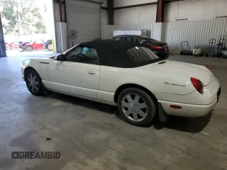 2002 Ford Thunderbird Hardtop Premium with VIN 1FAHP60A32Y125580, listed as a Copart auction lot 77493514 with 74,619 mi miles and Salvage Title. Bid and sale history available at DreamBid. Image 2.