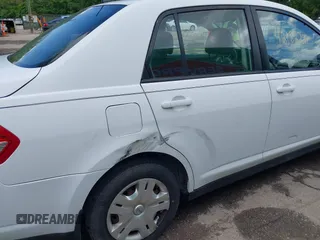 2010 Nissan Versa S with VIN 3N1BC1AP2AL409285, listed as a IAAI auction lot 42182721 with 266,855 mi miles and . Bid and sale history available at DreamBid. Image 17.